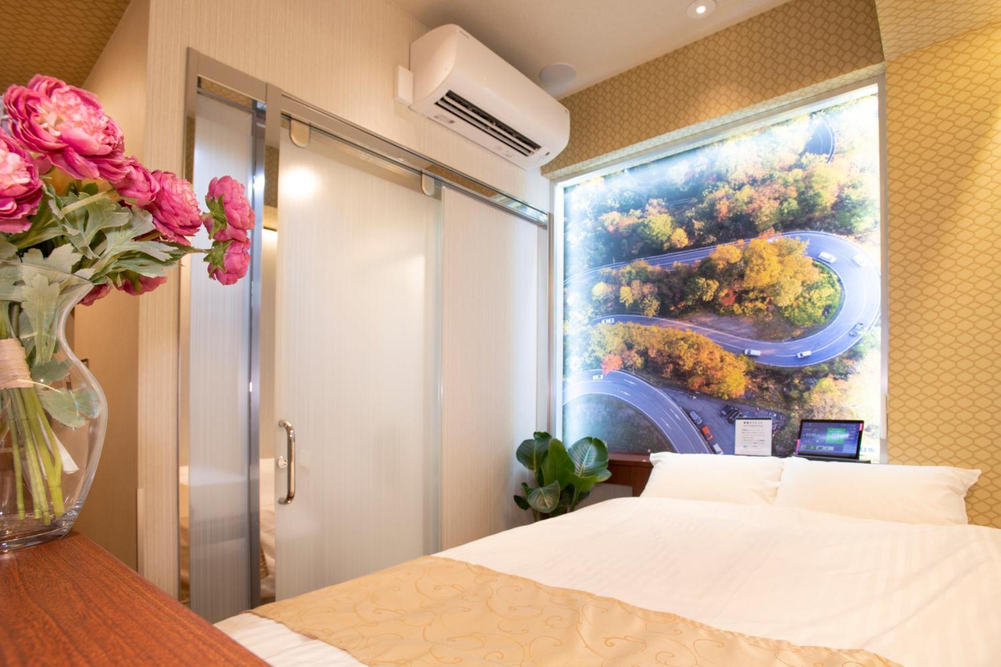 Hotel Xcell Hiroshima Nagarekawa Værelse billede